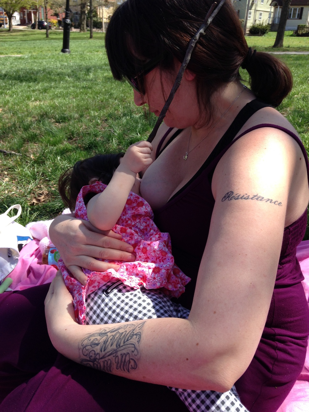 Pregnant while breastfeeding my one year old on a glorious NYC spring day